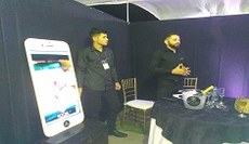 Aluno Robson e parceiro expondo a proposta de sua empresa no evento
